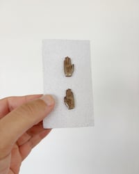 Image 2 of Studs | Manos 1