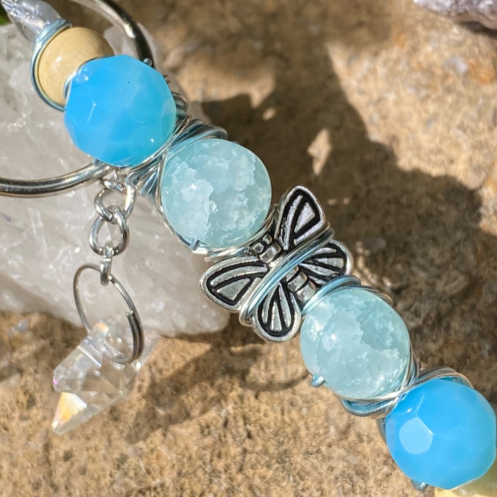 Image of blue monarch clip keychain