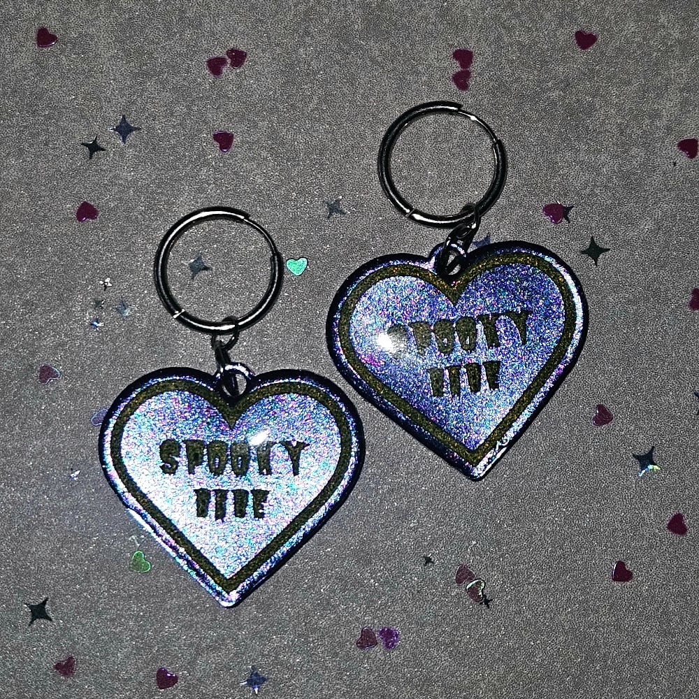Image of Spooky Babe Heart Earrings: Purple/ Blue Color-shift w/ Chartreuse Lettering