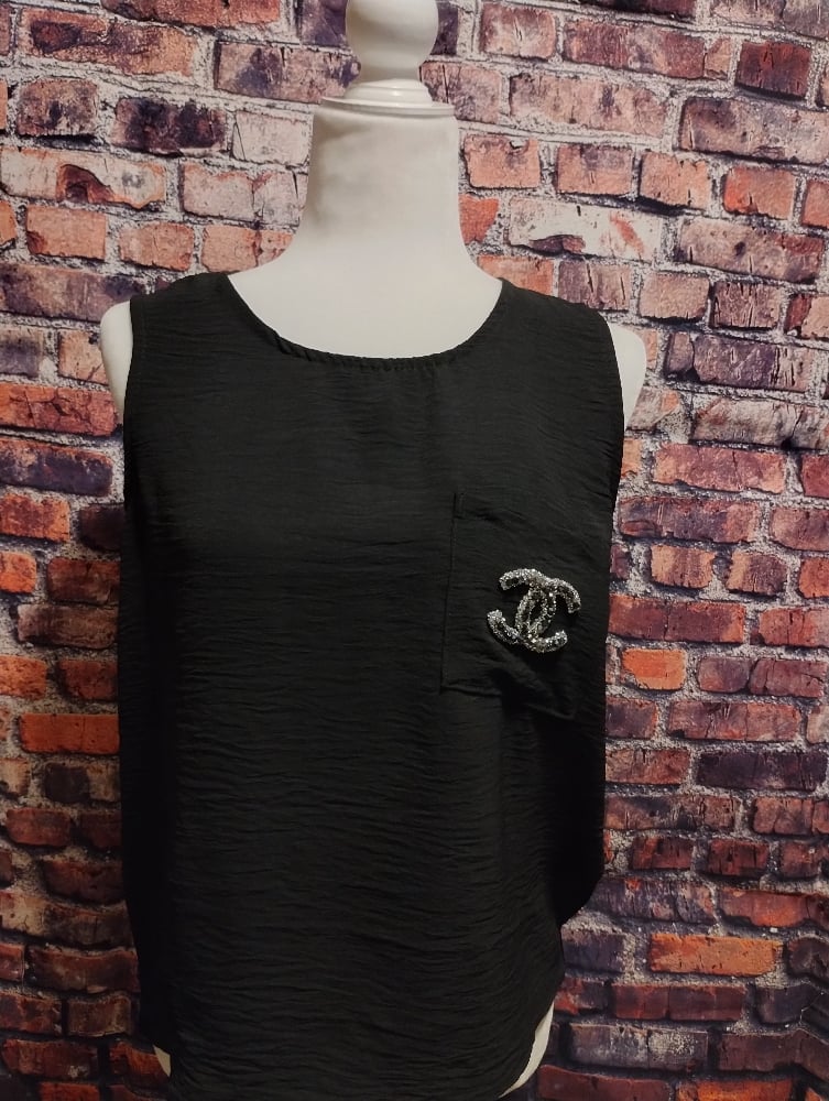 Image of Elegant Coco Chanel patched top