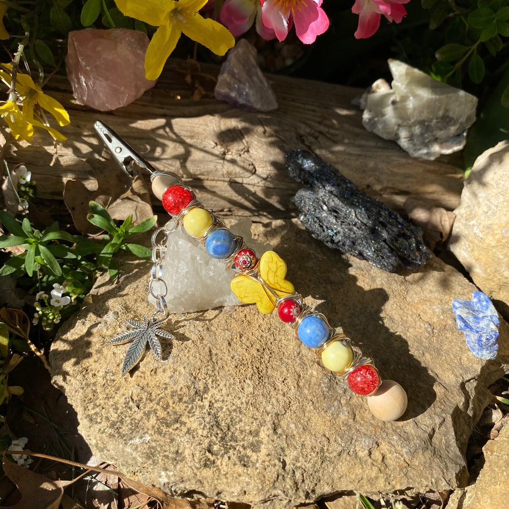 Image of summer butterfly roach clip