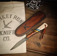 Image 1 of TRAPPER • cocobolo/white g10/trustone