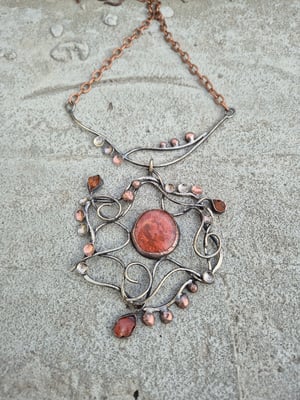 Red sun necklace 