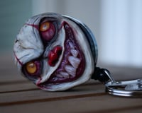 Image 19 of Handmade Pennywise Badge Reel Keychain 