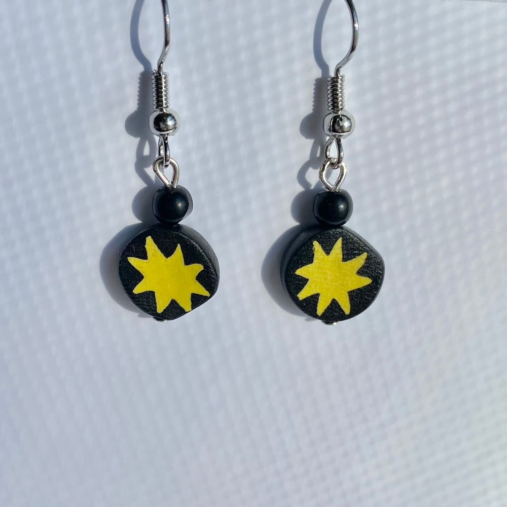 Image of star charm earrings 