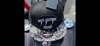 WL -9 snap-back, Black with Black and white paisley brim truckers hat