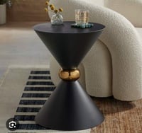 Image 3 of Bar table   With its sleek design and highlighted gold details in the middle