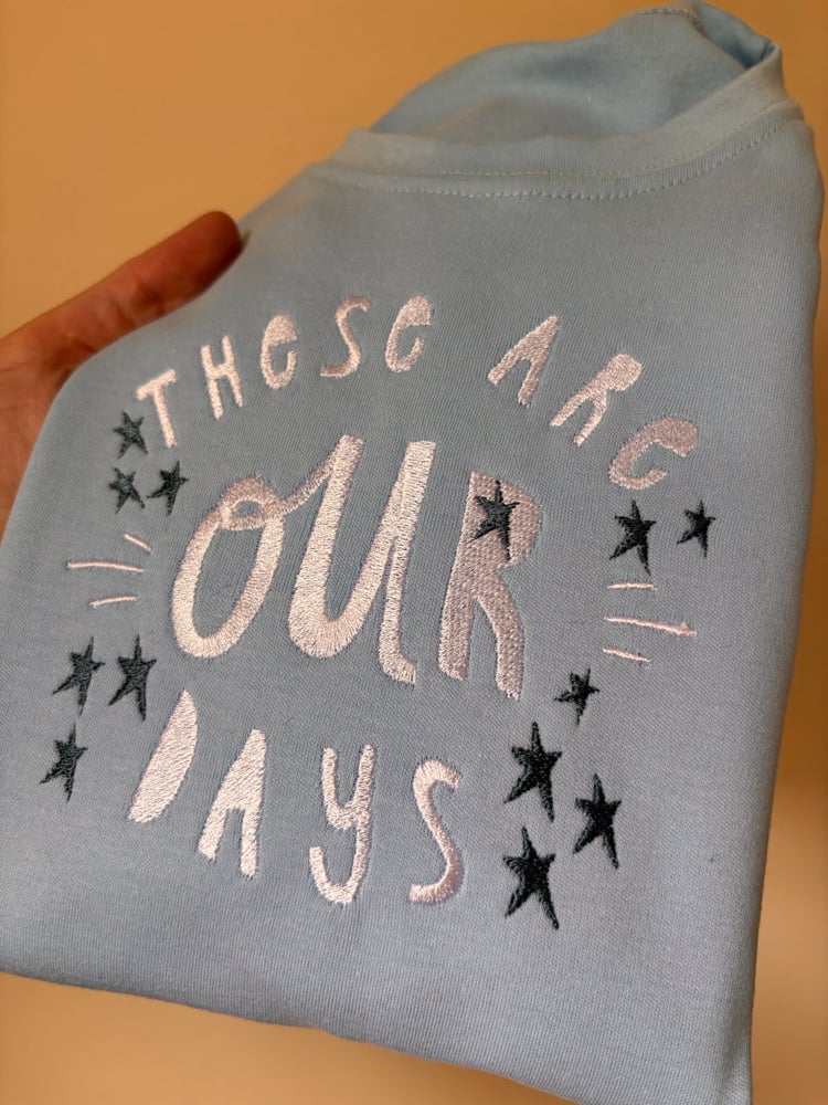 Image of 7-8 baby blue tee