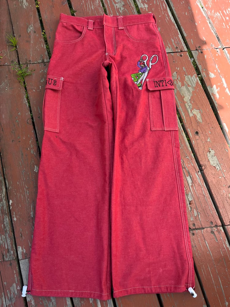 Image of red denim embroidered jeans 