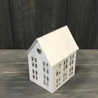 Rustic white tea light house 