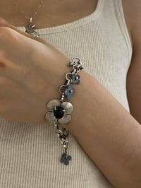 Image 2 of black petals bracklet