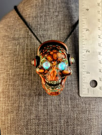 Image 12 of Opal Eyed SkullRocker Pendant