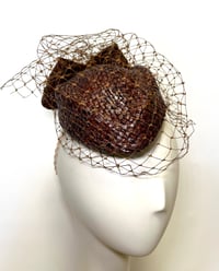 Image 1 of Brown straw percher. SOLD
