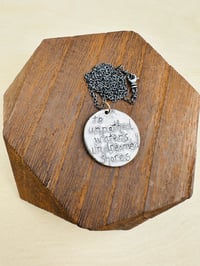 Image 8 of sapphire pendant with hand engraved Shakespeare quote