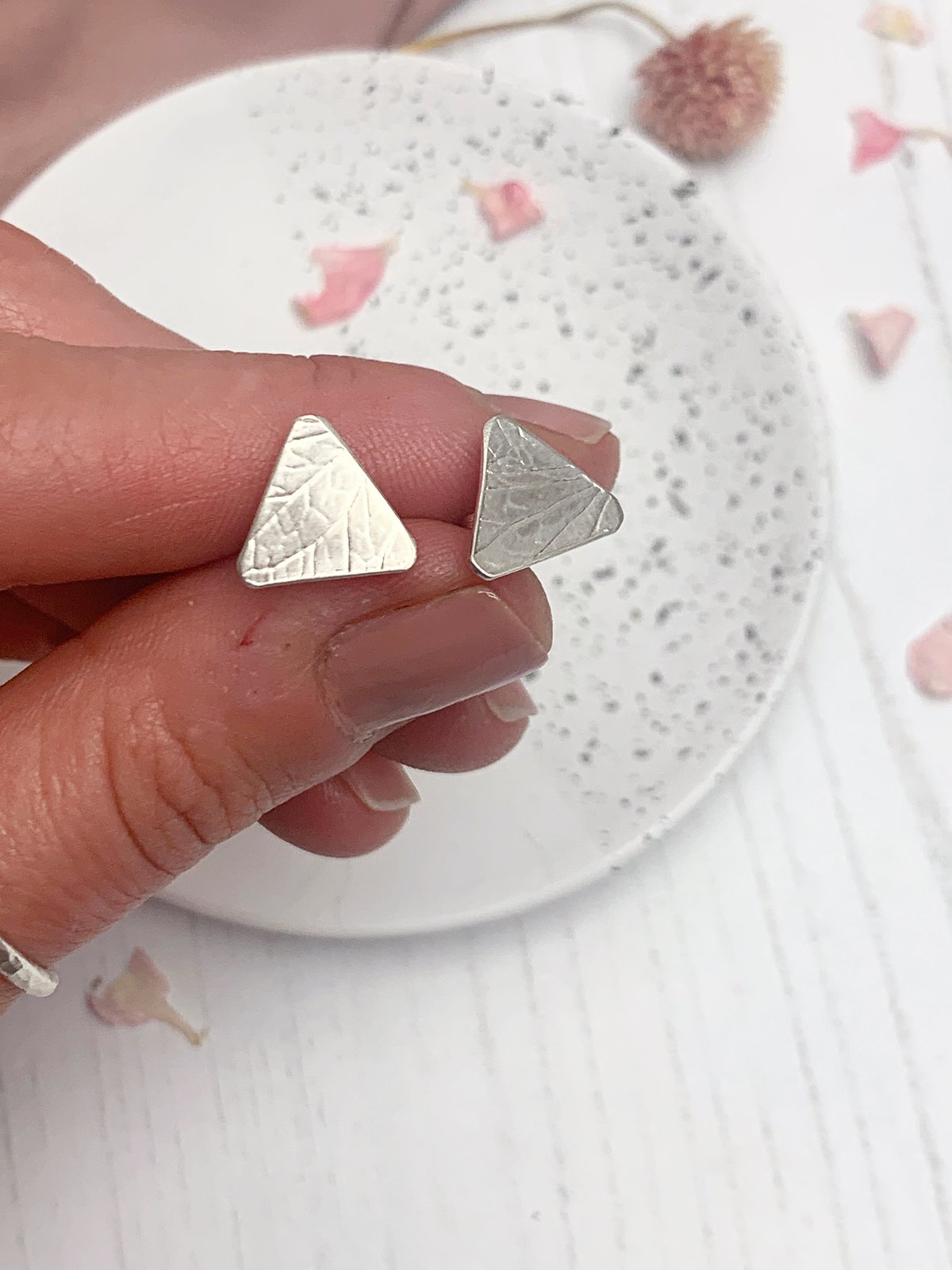 Image of Recycled sterling silver triangle stud earrings with hydrangea petal imprint