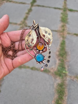 Blue and yellow bullet cussings necklace 