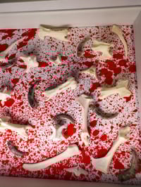 Image 3 of Bones with a blood spatter background