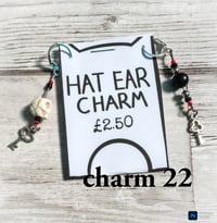 Image 22 of Ed’s hat ear charms
