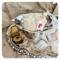 Image 2 of Handmade pin cushion sitting on a silver style tray