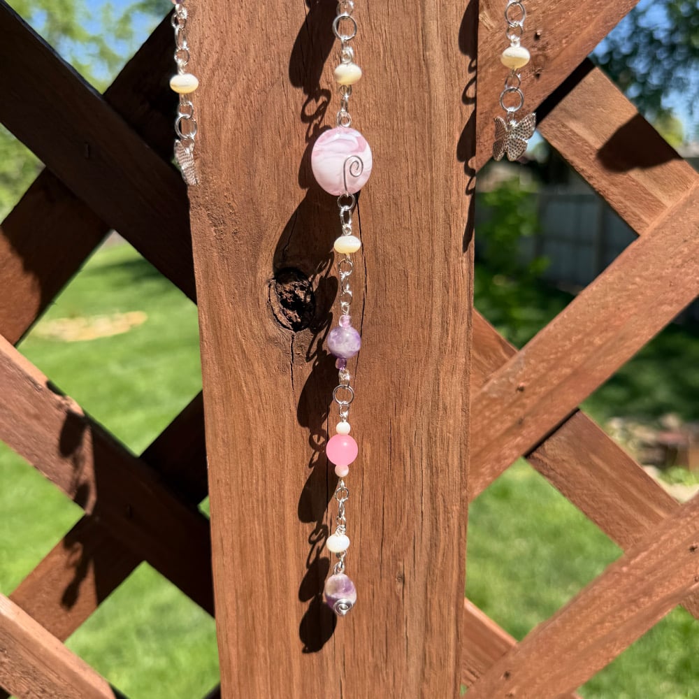 Image of divine butterfly hanging beaded wood art