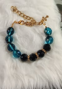 Image 1 of BLACK BLUE & GOLD BRACELET 