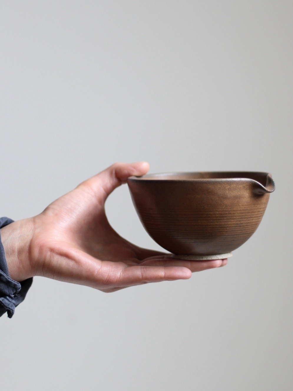 Image of matcha bowl in textured tamba