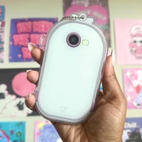 Image 2 of illit fandom phone. 