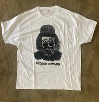 Image 1 of Guy wearing P Hat (white tshirt)