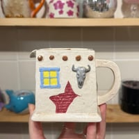 Image 1 of woodstock scented adobe style candle