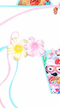 Image 4 of Diver swimming with tropical fish hellokitty