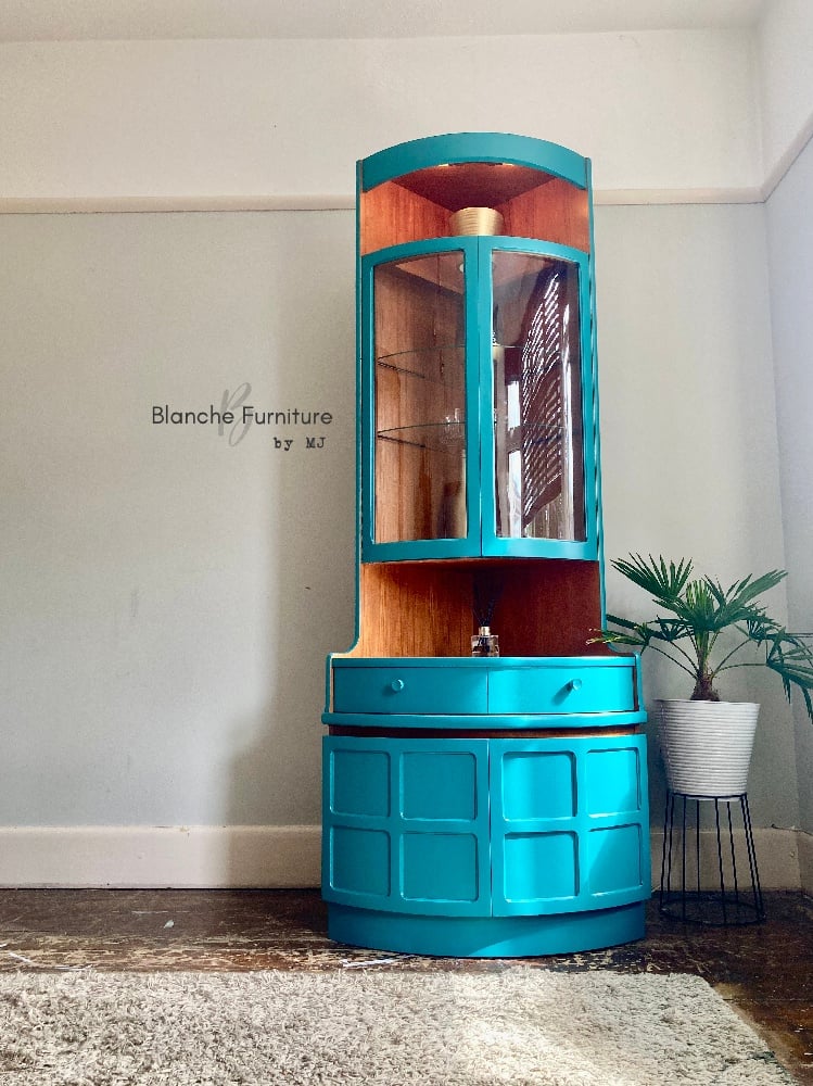 Nathan Corner Drinks Cabinet unit with light in vibrant teal