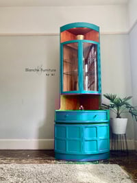 Image 1 of Tall, Mid Century, Curved Corner Drinks Cabinet unit with light in vibrant Teal - by Nathan