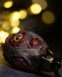 Image 14 of Egg of the King pendant, leather cord, brass hardware, all seeing glowing eyes