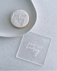 ‘Sip sip hooray’ raised stamp
