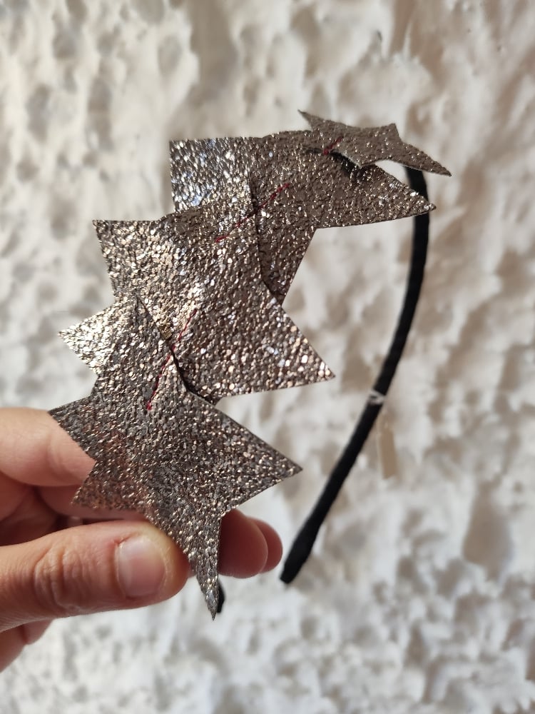 Image of Cerchietto stelle base nera