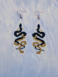 Double snake fringe earrings