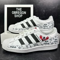 Image 1 of ADIDAS PHILIP COLBERT X SUPERSTAR SAVE THE LOBSTER WOMENS SHOES SIZE 7.5 WHITE BLACK RED NEW