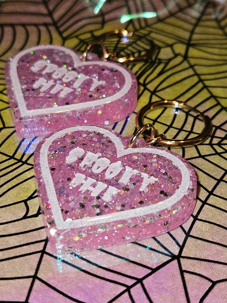 Image of Spooky Babe Heart Earrings: Baby Pink Sparkle with White Lettering