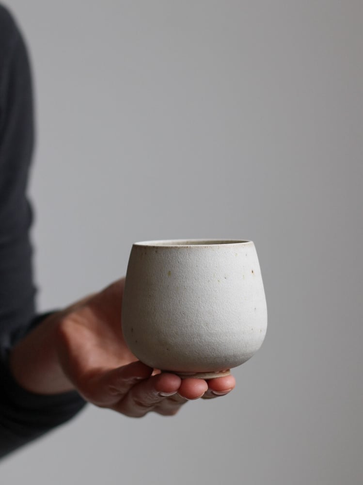 Image of small cup in ivory