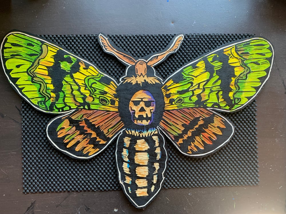 Death Moth carving