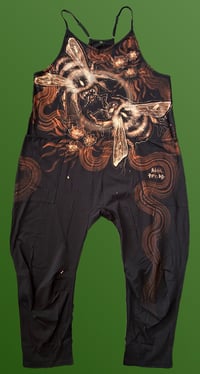 Image 1 of “SPRING HAS SPRUNG” CUSTOM BLEACH PAINTED OVERSIZED ROMPER MEDIUM