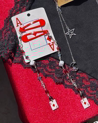 Image of red poker hair clip set