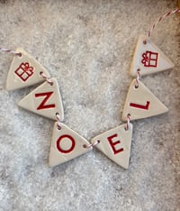 Image 1 of Noel Triangle Bunting 