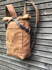 Image 2 of Waterproof backpack medium size rucksack in waxed canvas, with volume front pocket and double layere