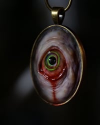 Image 9 of Color Shift Eye glow in the dark pendant OOAK