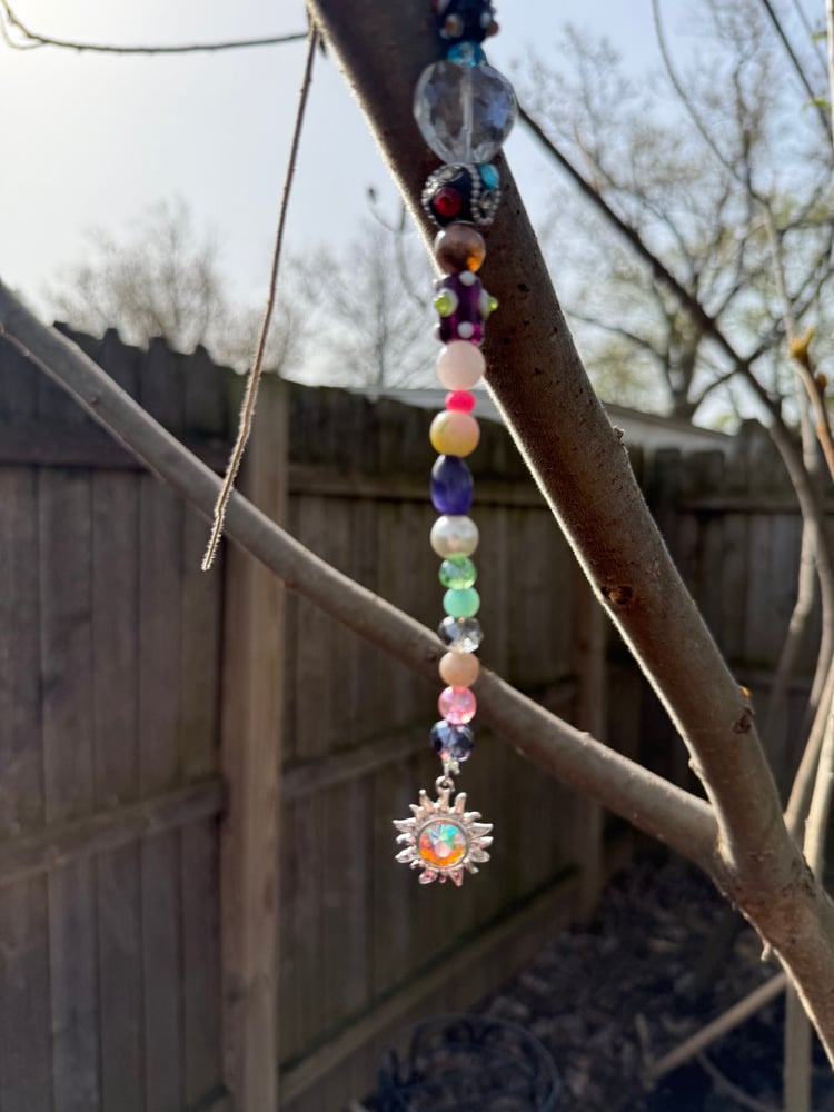 Image of Blazing sun plant charm ☀️🪴