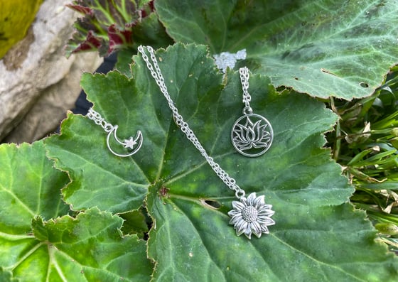 Image of Sunflower, lotus or moon and star necklace 