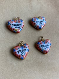 Image 3 of motherly love charm