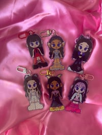 Image 1 of katseye 'monstereye v1' moveable ear keychains.