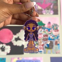 Image 5 of katseye 'monstereye v1' moveable ear keychains.